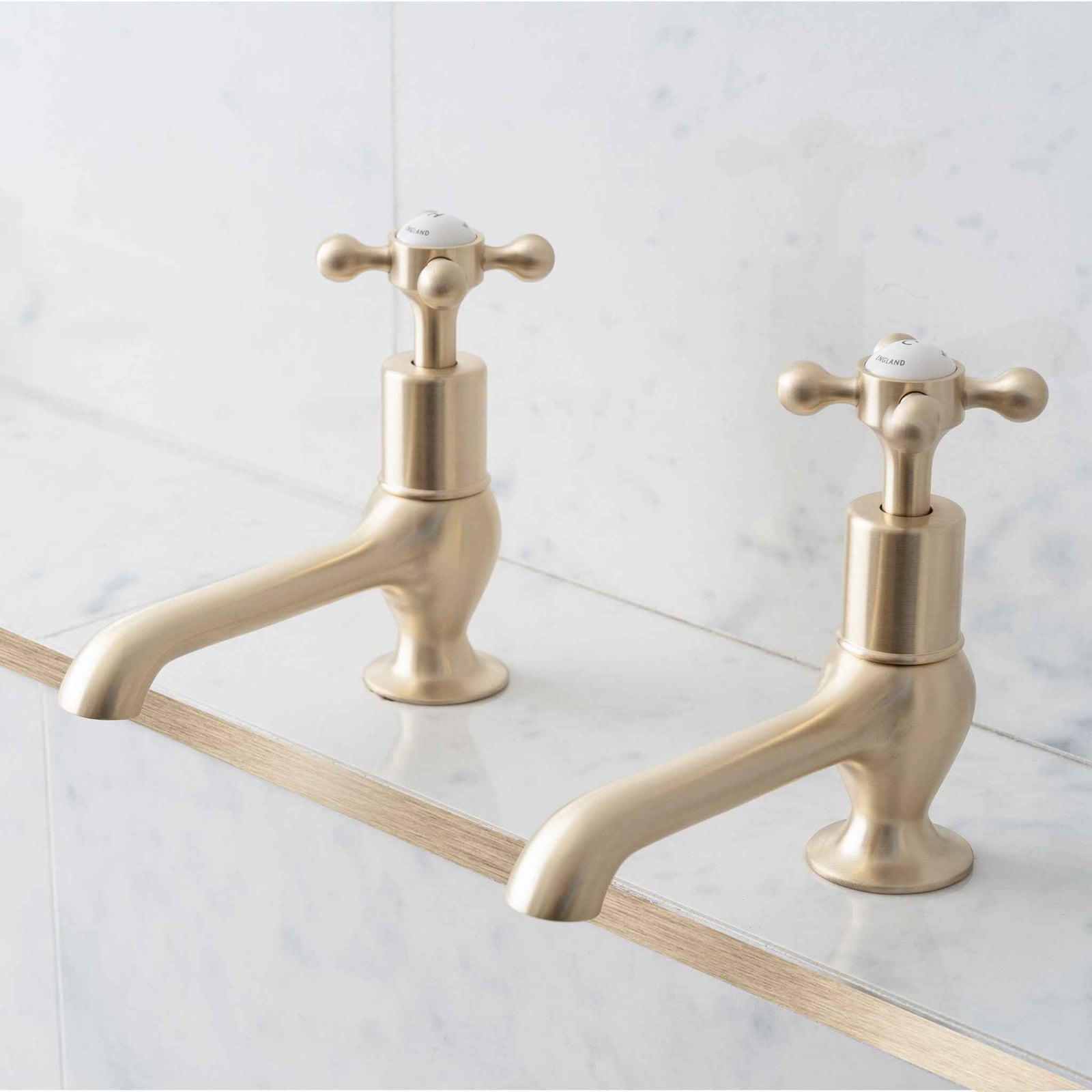 Grayling Long Nose White Ceramic Crosshead Basin Pillar Taps - Rutland London (UAE)
