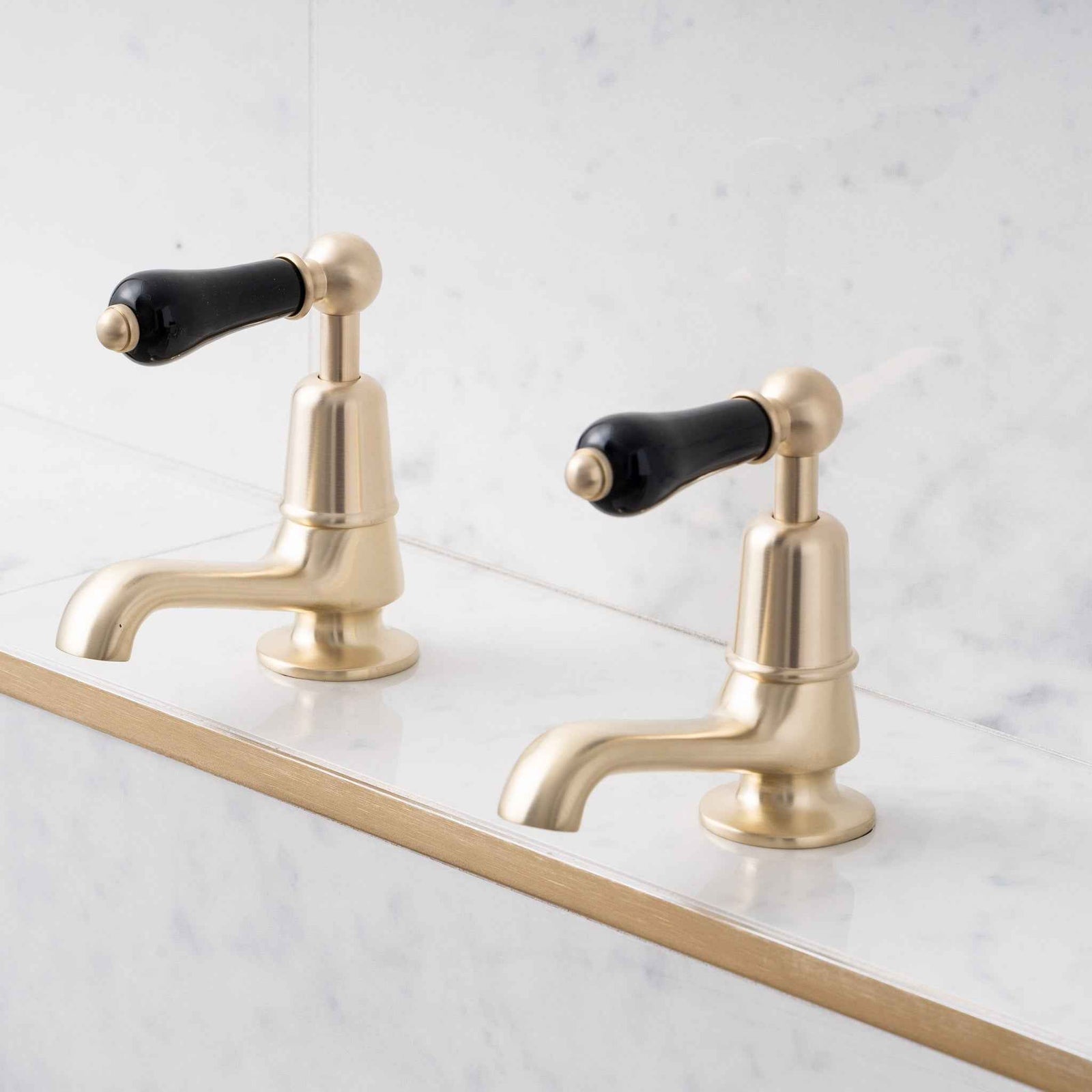 Brunswick Black Ceramic Lever Basin Pillar Taps - Rutland London (UAE)