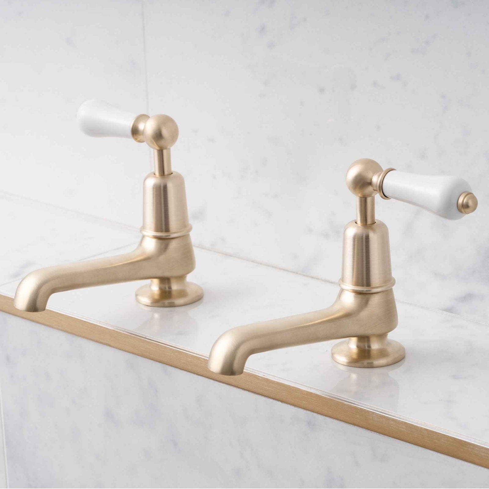 Tavistock Long Nose White Ceramic Lever Basin Pillar Taps - Rutland London (UAE)